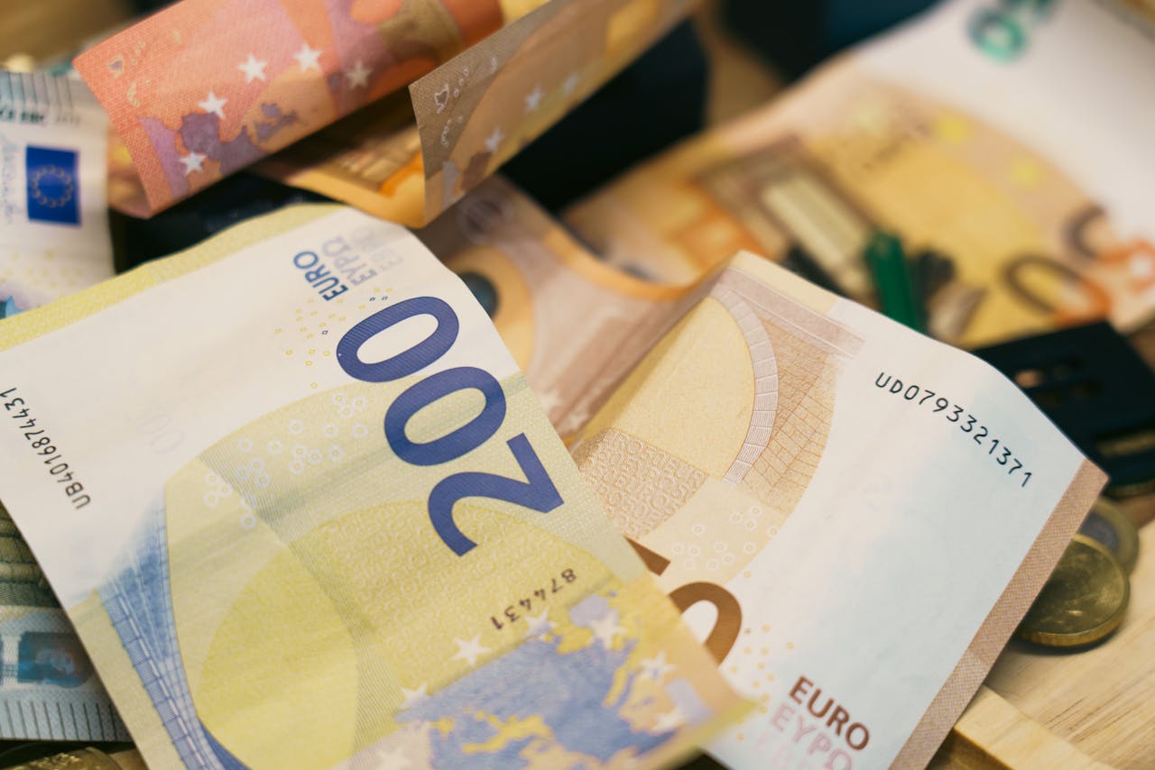 euro banknotes coins, real estate financial concept